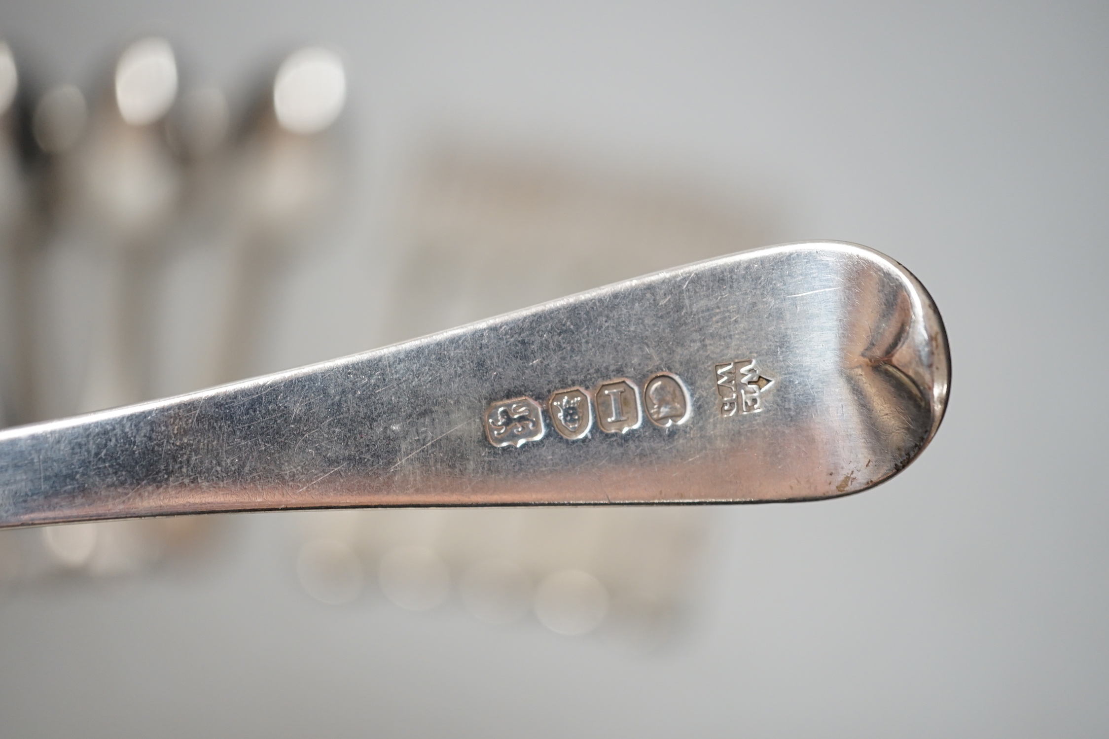 A harlequin set of six Georgian Scottish silver fiddle pattern table forks and a similar harlequin set of six Old English fiddle pattern table spoons, 24.1oz.